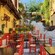 Restaurant tables and chairs in an alleyway
